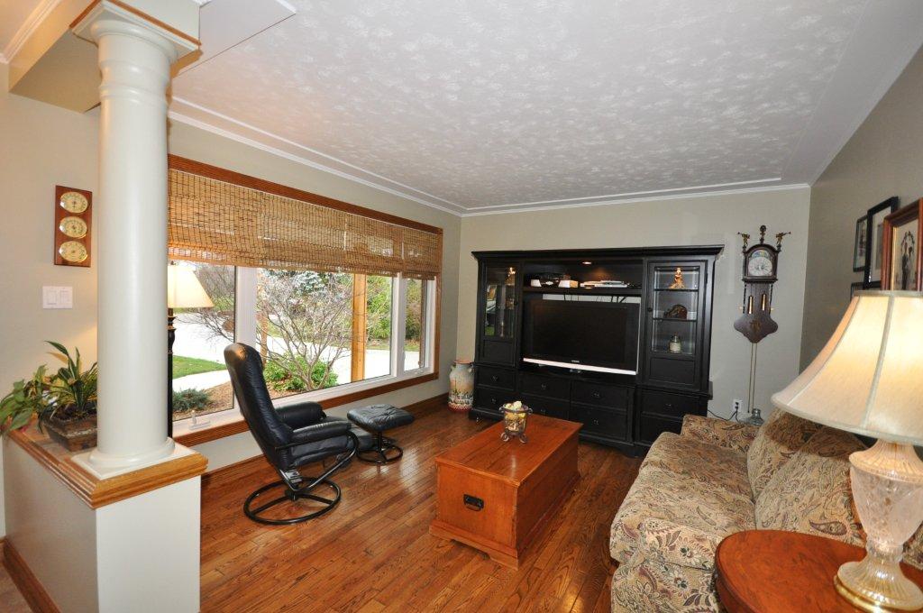 Formal Living Room offers gleaming hardwood flooring
