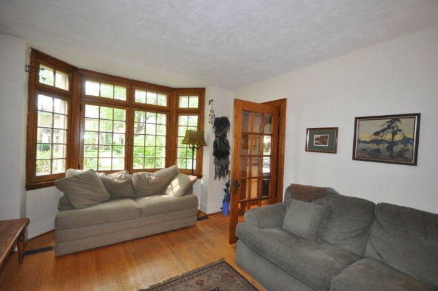 Living room has large bay window